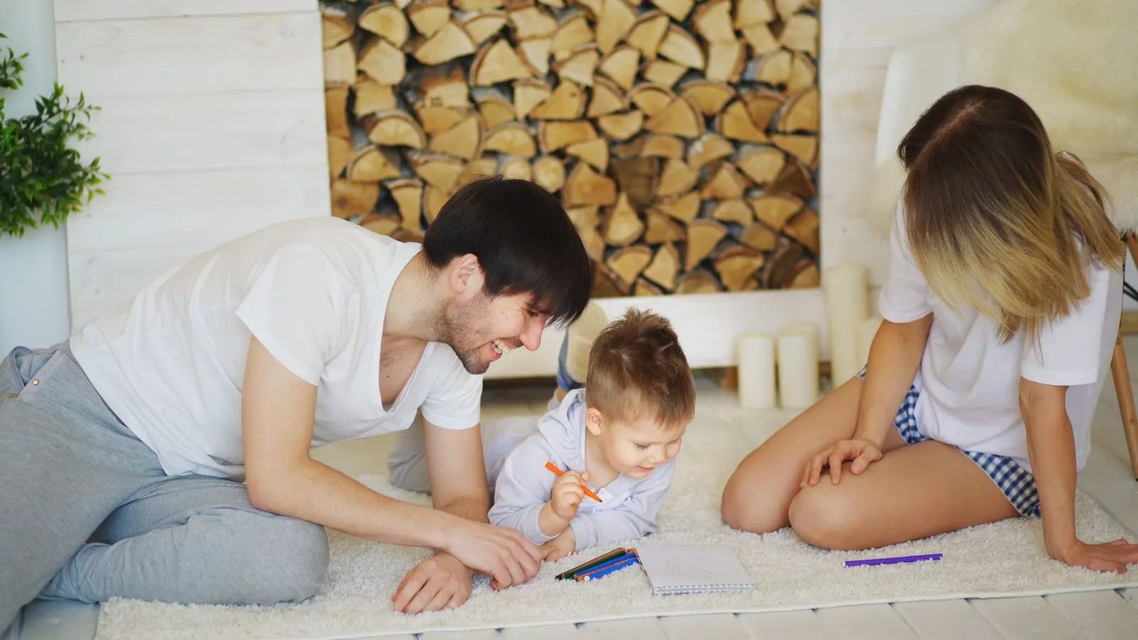 A parent helping their young child at home, a warm moment of support